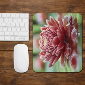 red dahlia flower mouse pad on wooden desk aesthetic gaming desk setup with keyboard and mouse