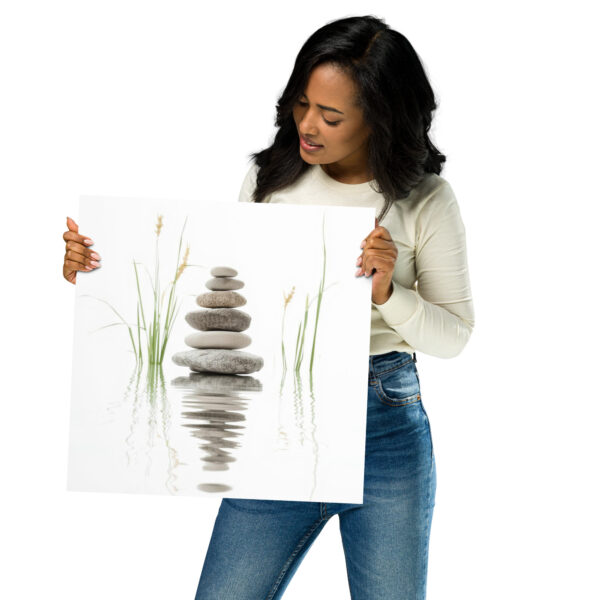 Stacked zen stones reflected in calm water with green grasses, minimalist neutral spa wall art
